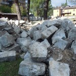 Le pietre recuperate della torre campanaria